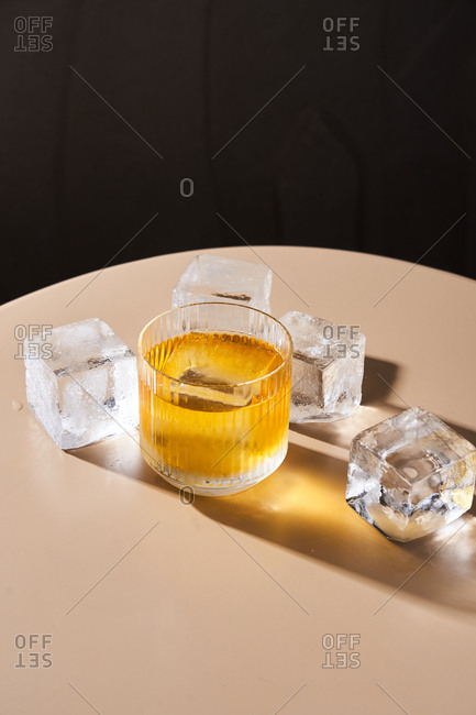 Cocktail with cube shaped ice cubes