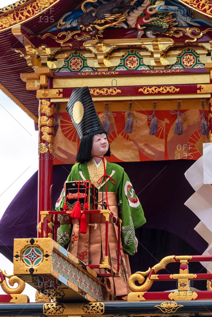 April 15, 2019: Mechanical marionette on a ornate traditional wooden float during the Takayama Spring Festival. Takayama, Japan
