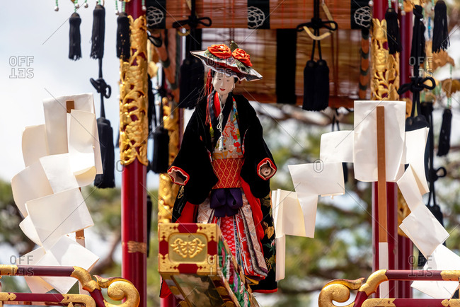 April 15, 2019: Mechanical marionette on a ornate traditional wooden float during the Takayama Spring Festival. Takayama, Japan