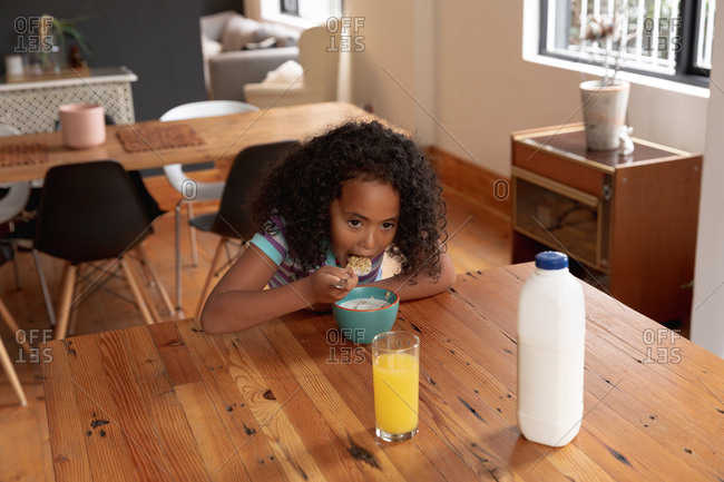 Juice In Glass Jar And Orange On Kitchen Table. Stock Photo