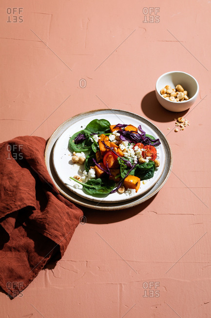 Salad on pink background