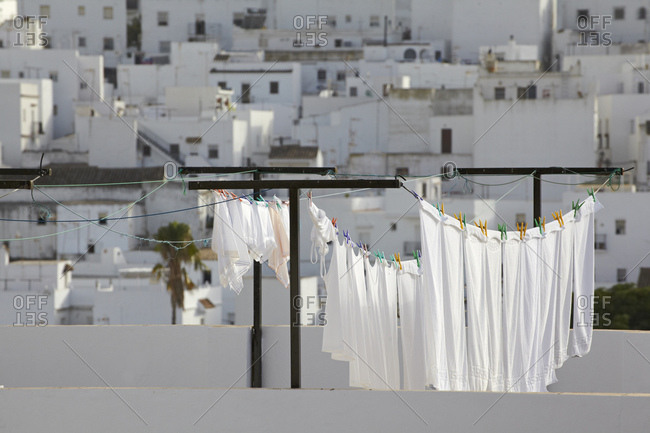 Spain- Andalusia- Conil de la Frontera- drying clothes with building in background