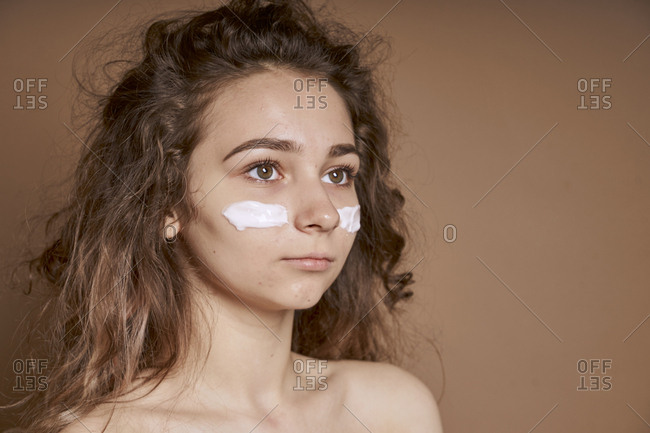 Woman young and cute using beauty mask under eye