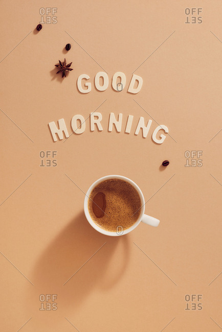 Good Morning written over a hot cup of coffee