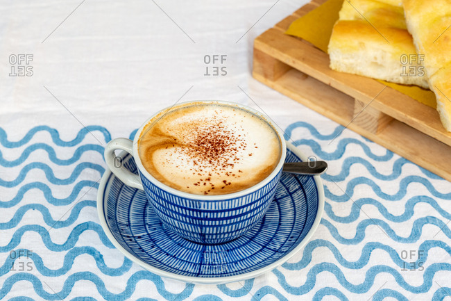 A cappuccino and focaccia