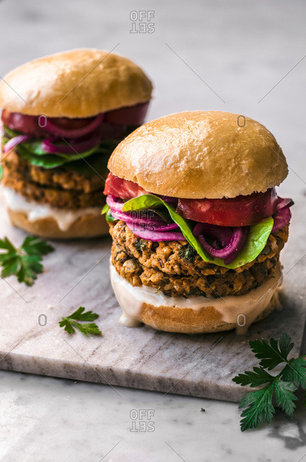 Sweet Potato Chickpea Burgers on a marble background