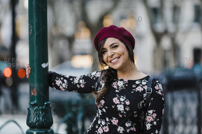 Portrait carefree young woman in beret