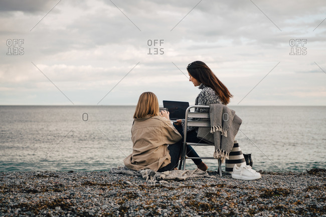 Nude Beach Rear View - beach lifestyle home stock photos - OFFSET