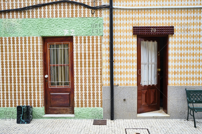 Portugal- Porto- Afurada- Two traditional house facades seen during daytime