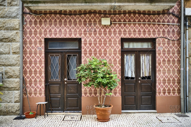 Portugal- Porto- Afurada- Front view of unique ornate house facade