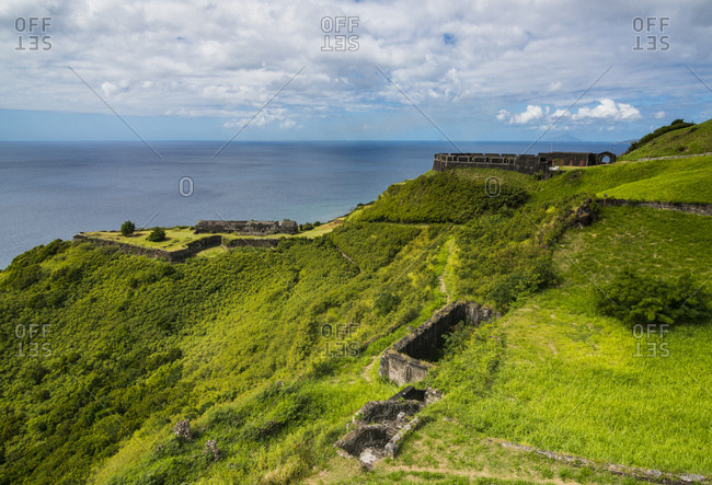 Scenic view of Brimstone hill fortress by sea against sky- St. Kitts and Nevis- Caribbean