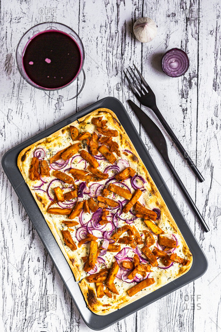Tart with cheese- garlic- red onions- gyros strips and sauerkraut cabbage