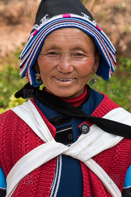 March 16, 2019: Portrait of a woman in traditional costume of the Naxi ethnic group. Lijiang, China