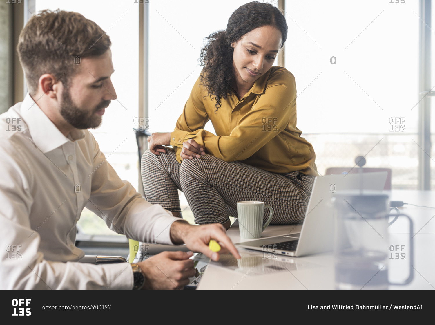 Businessman and businesswoman having a meeting in office