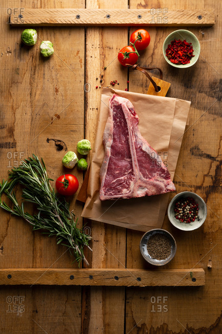 Raw beef meat on butcher pepar