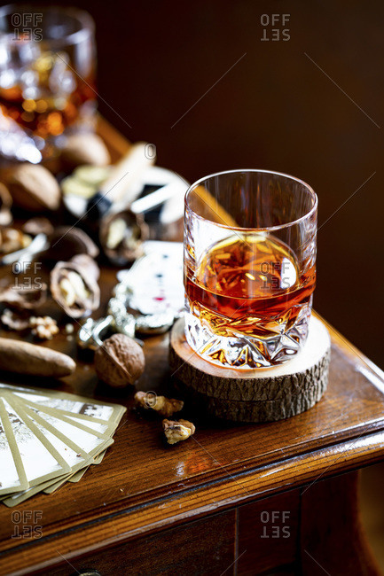 Alcohol and Cigar with nuts, vintage playing cards.