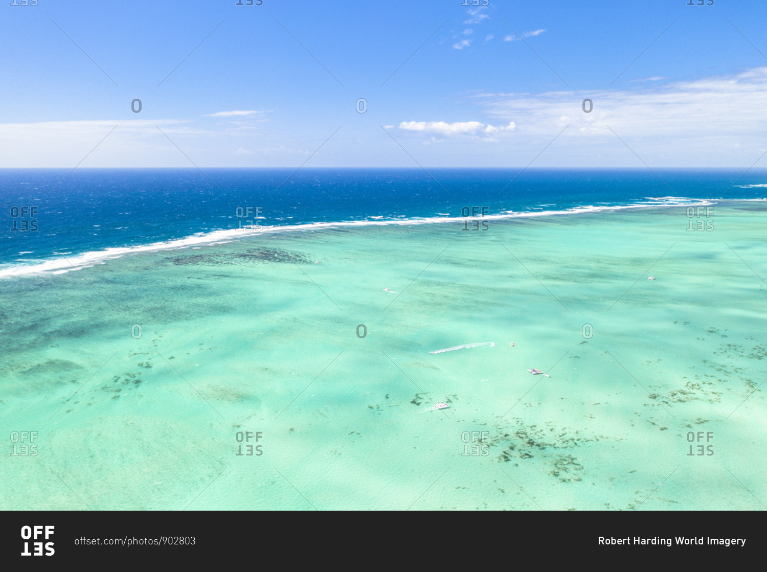 Turquoise coral reef meeting the blue Indian Ocean, aerial view by drone, Ile Aux Cerfs, Flacq district, Mauritius, Indian Ocean, Africa