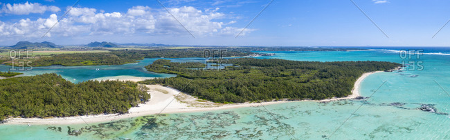 Aerial by drone of white sand beach and turquoise tropical lagoon, Ile Aux Cerfs, Flacq, East Coast, Mauritius, Indian Ocean, Africa