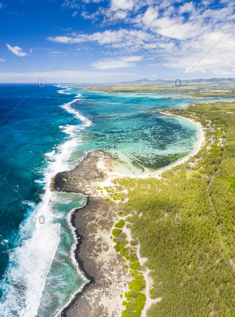 Aerial panoramic of tropical Public Beach washed by the ocean waves, Poste Lafayette, East coast, Mauritius, Indian Ocean, Africa