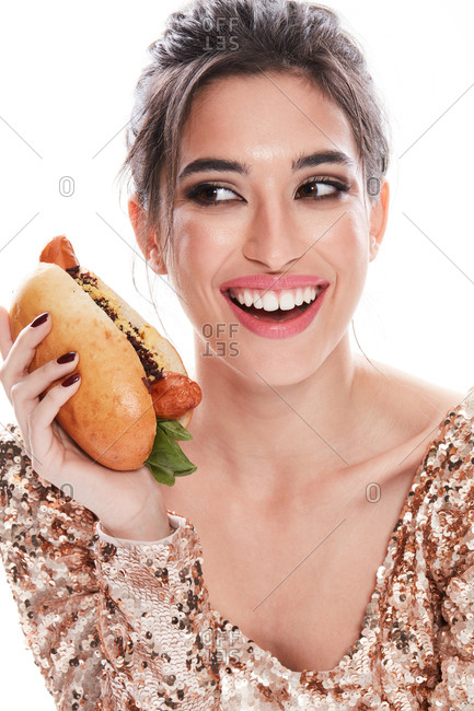 woman eating hot dogs