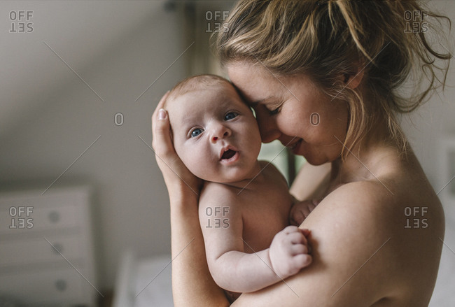 Mother with baby boy at home