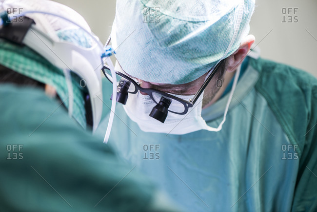 Surgeons during an operation - Offset