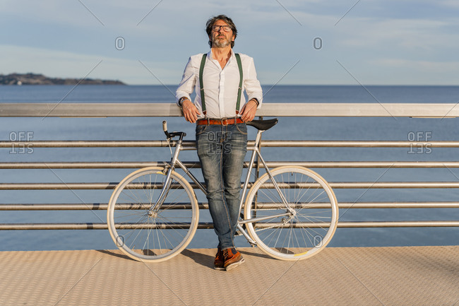 Man with fixie on a jetty