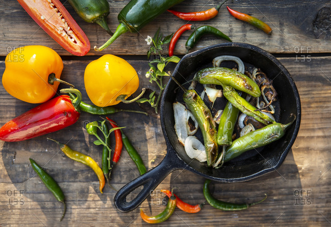 Overview of Mexican chilis over a wooden table