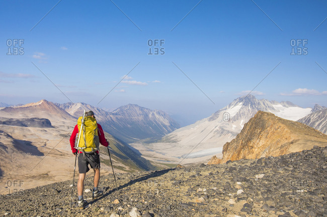backpacker approaches view of Athelney Pass, British Columbia, Canada