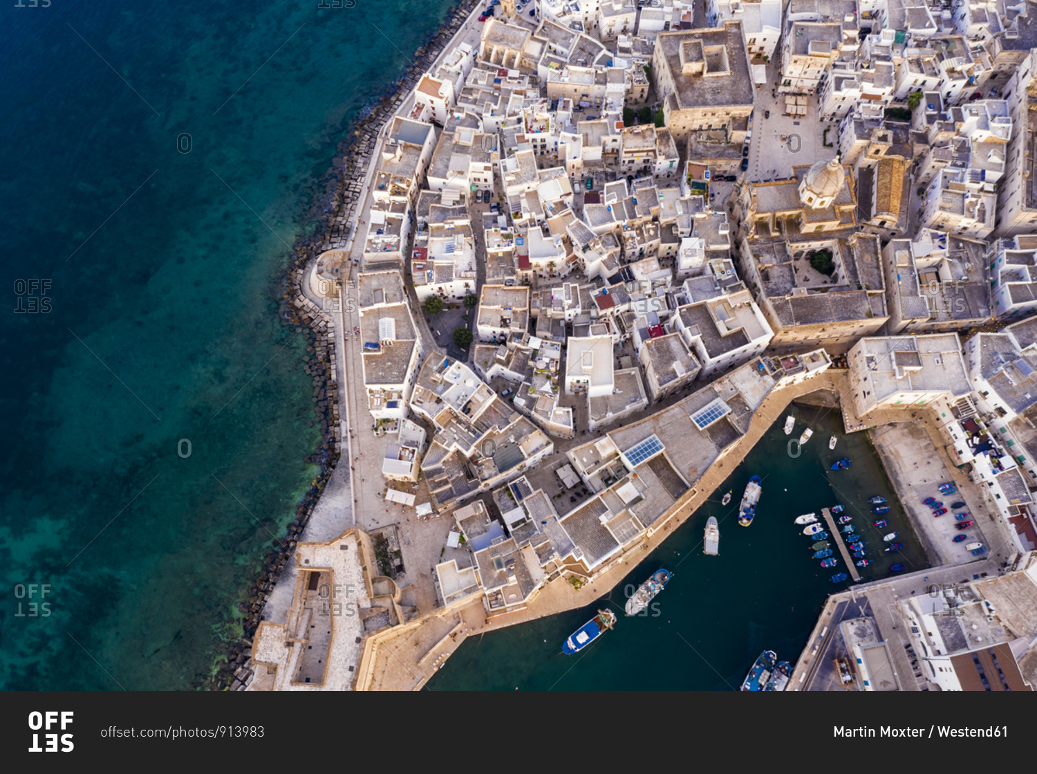 Italy- Apulia- Monopoly- Aerial view of sea and old town at sunset