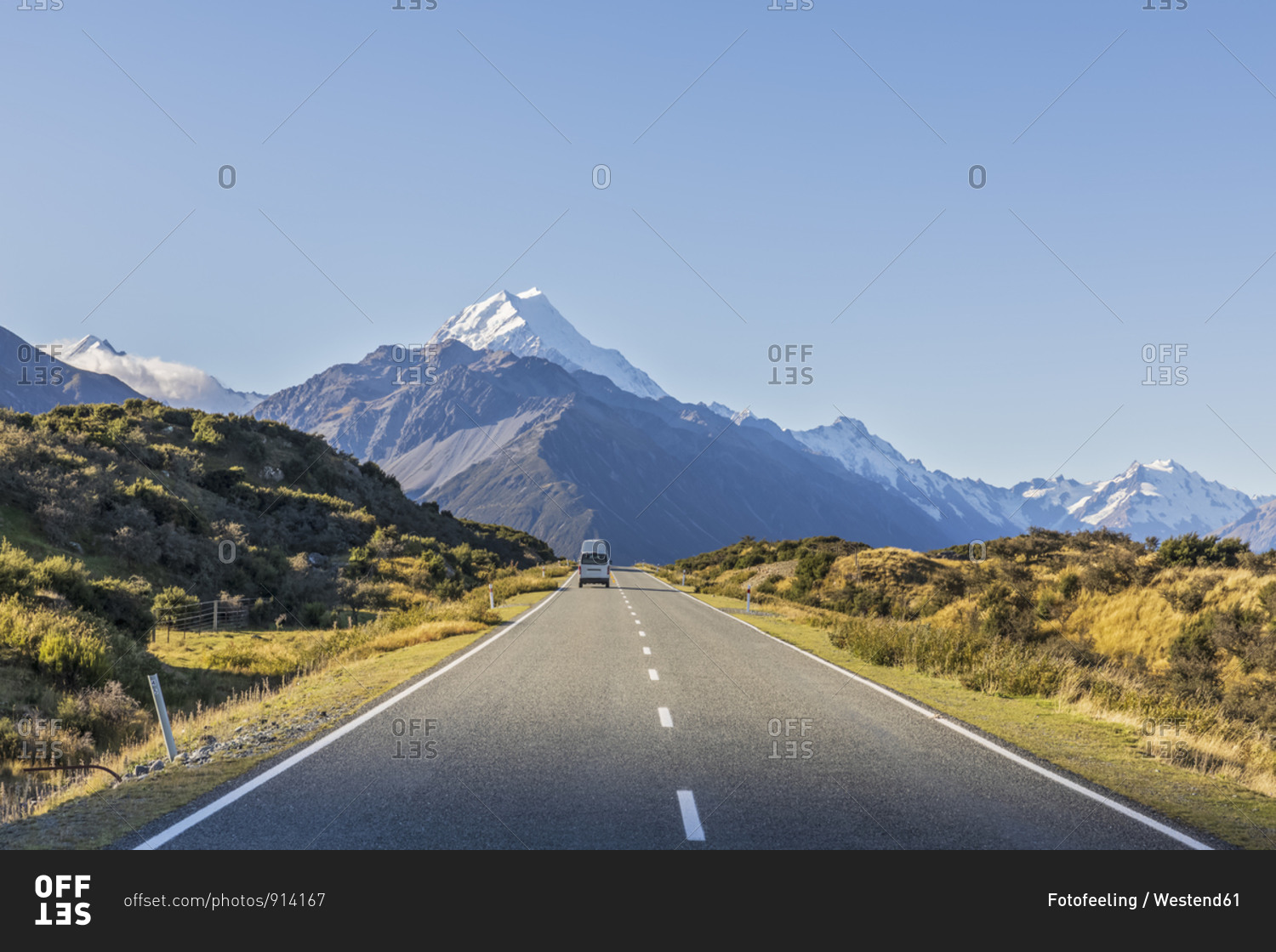 New Zealand- Oceania- South Island- Canterbury- Ben Ohau- Southern Alps (New Zealand Alps)- Mount Cook National Park- Mount Cook Road and Aoraki / Mount Cook- Camper on road in mountain landscape