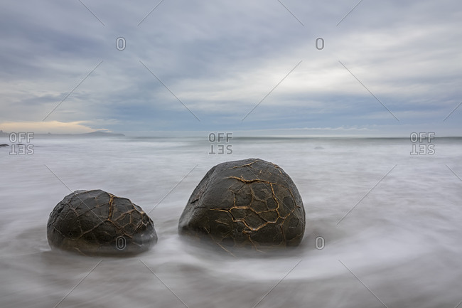 New Zealand- Oceania- South Island- Southland- Hampden- Otago- Moeraki- Koekohe Beach- Moeraki Boulders Beach- Moeraki Boulders- Round stones on beach