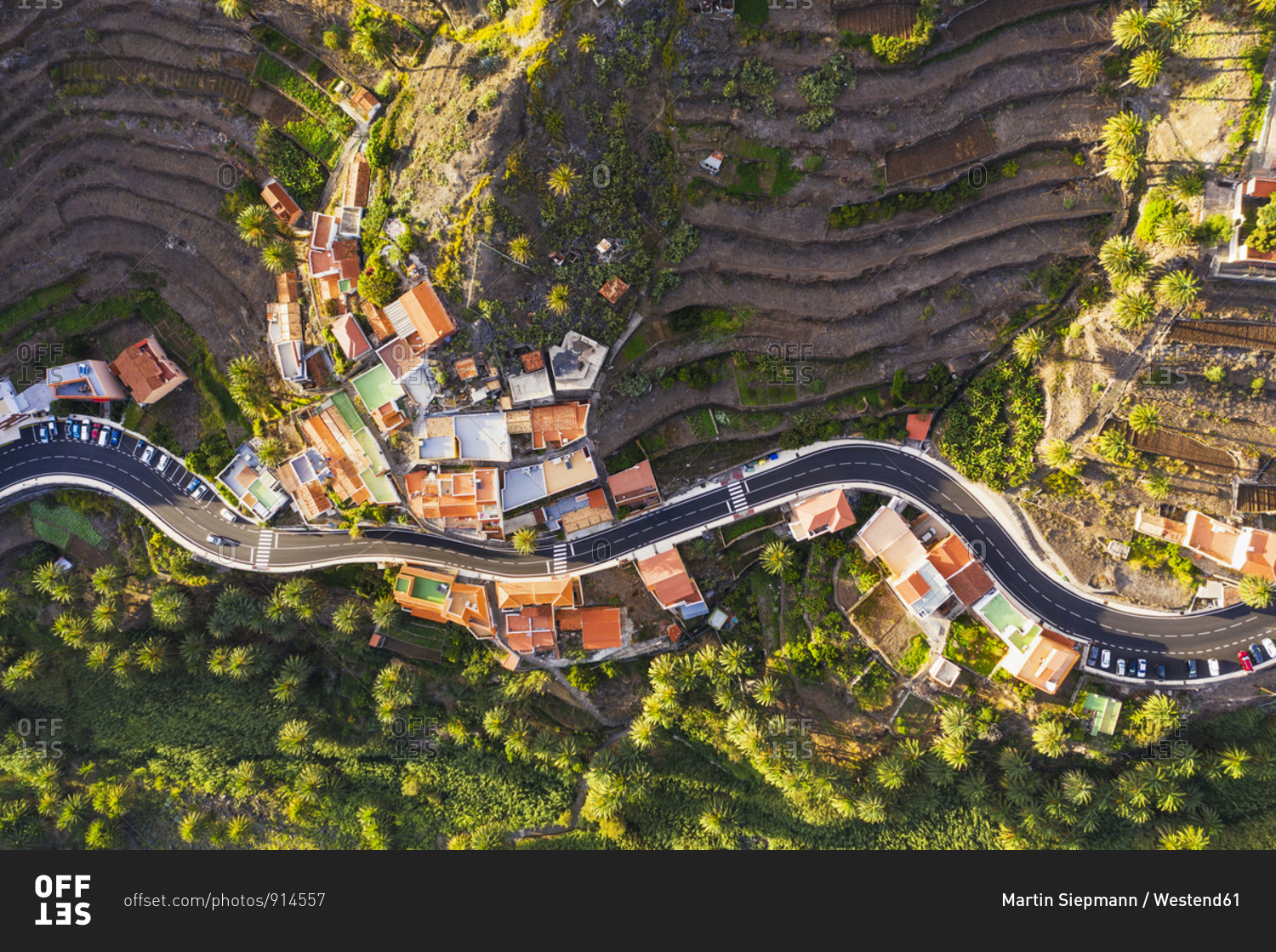 Spain- Canary Islands- La Gomera- Valle Gran Rey- Los Granados- Aerial view of town and winding road