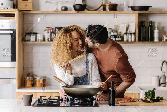 WOMAN COOKING Stock Photos OFFSET