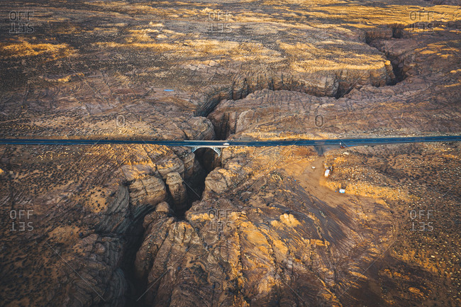 A slot canyon with a crossing road in Arizona