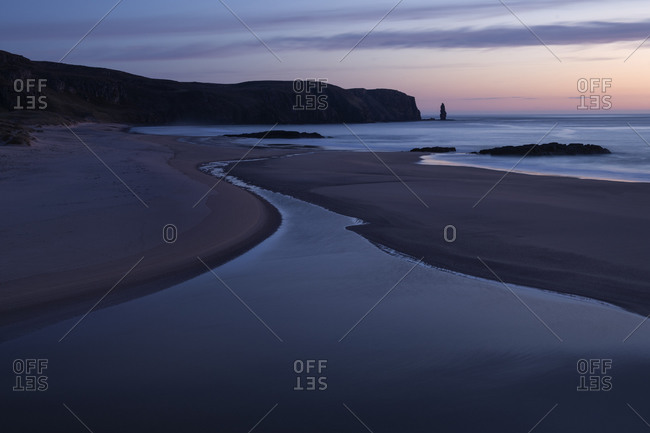 Twilight light over Isolated Sandwood bay beach, Sutherland, Scotland