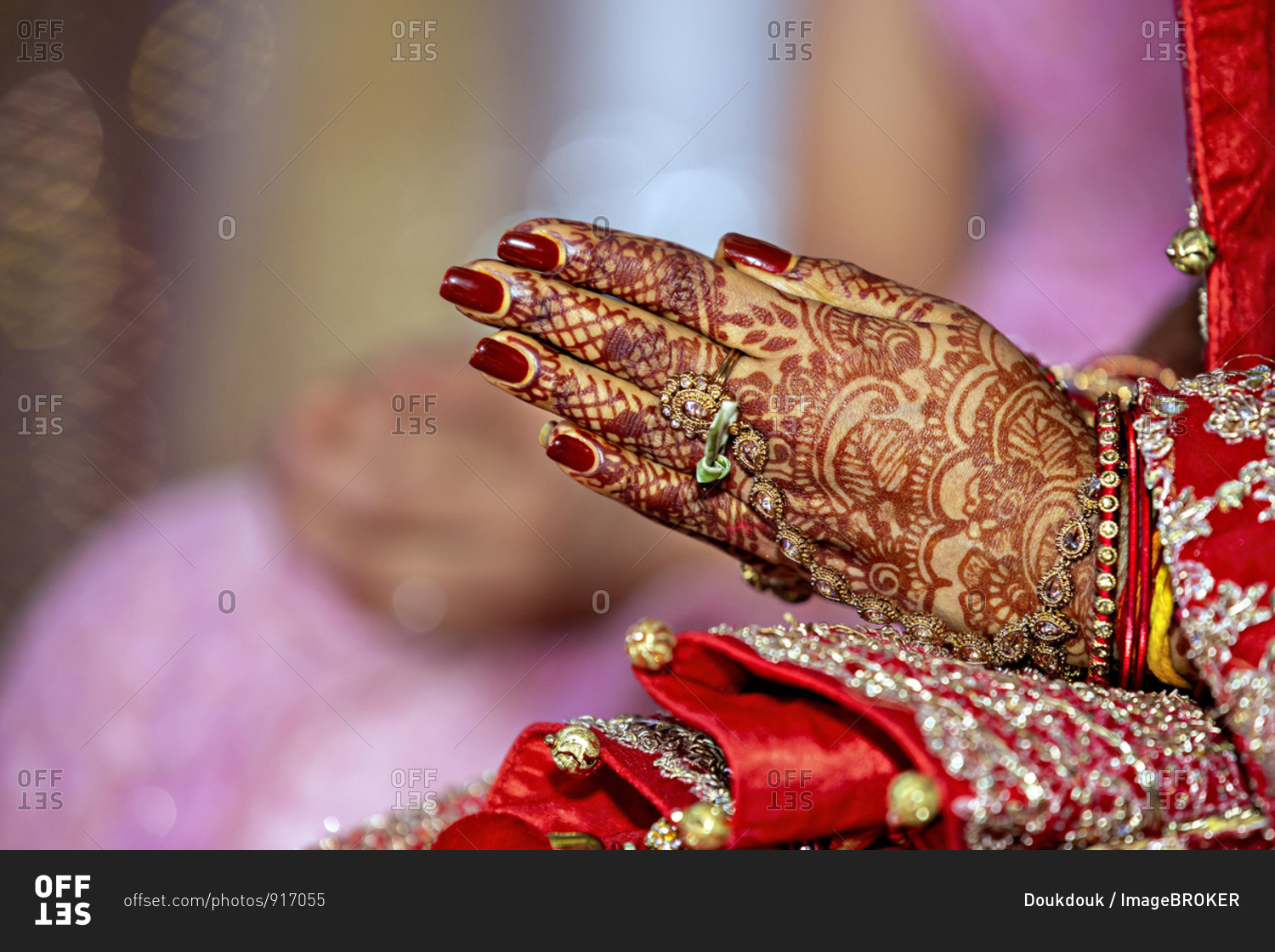 Traditional bridal jewelry and henna decoration on the hands of the bride during a religious ceremony at a Hindu wedding, Mauritius, Africa