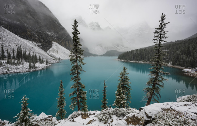Turquoise Moraine Lake, first snowfall in autumn, Valley of the Ten Peaks, Banff National Park Rocky Mountains, Alberta, Canada, North America