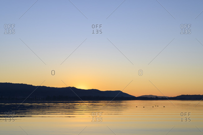Germany- Baden-Wurttemberg- Clear sky over Lake Constance at sunset