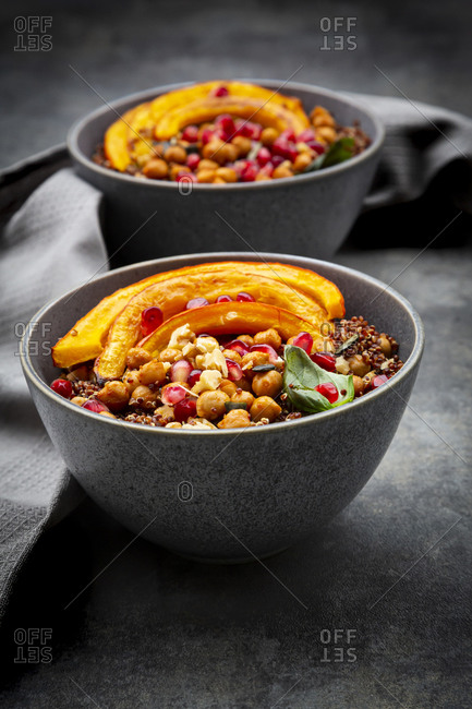Red quinoa with baked pumpkin- chickpeas- pomegranate- basil- walnuts and pumpkin seeds