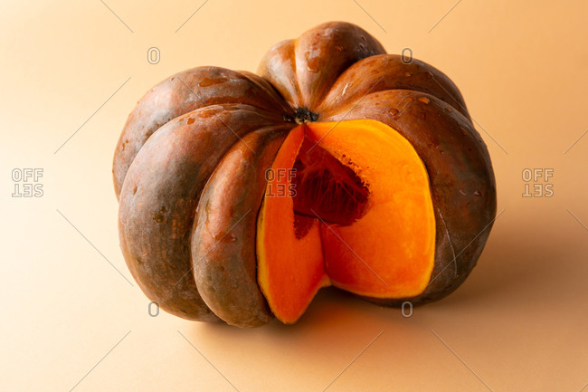 Orange pumpkin on orange background