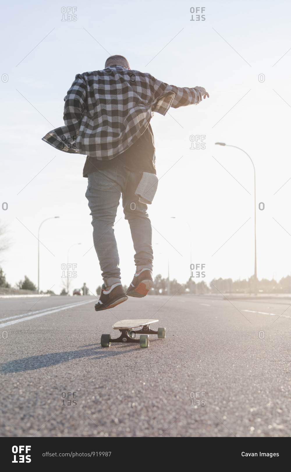 Young man skateboarding in the street