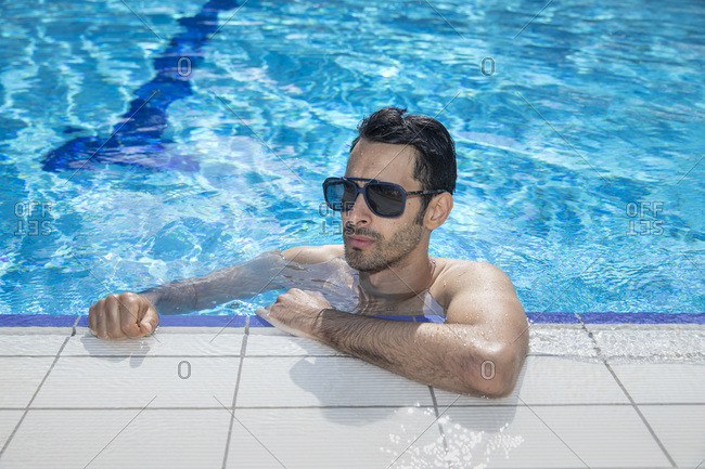 Man Floating In Swimming Pool High-Res Stock Photo - Getty Images