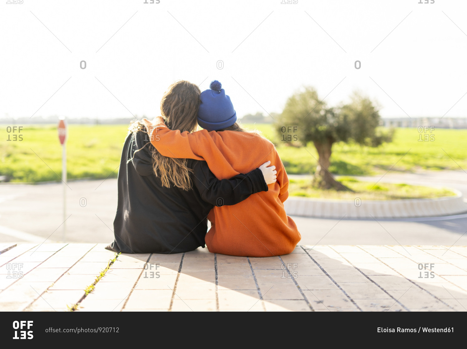 girls back to back stock photos - OFFSET