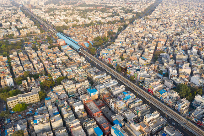 March 18, 2020: Aerial view of New Delhi public transport system crossing neighborhood, India.
