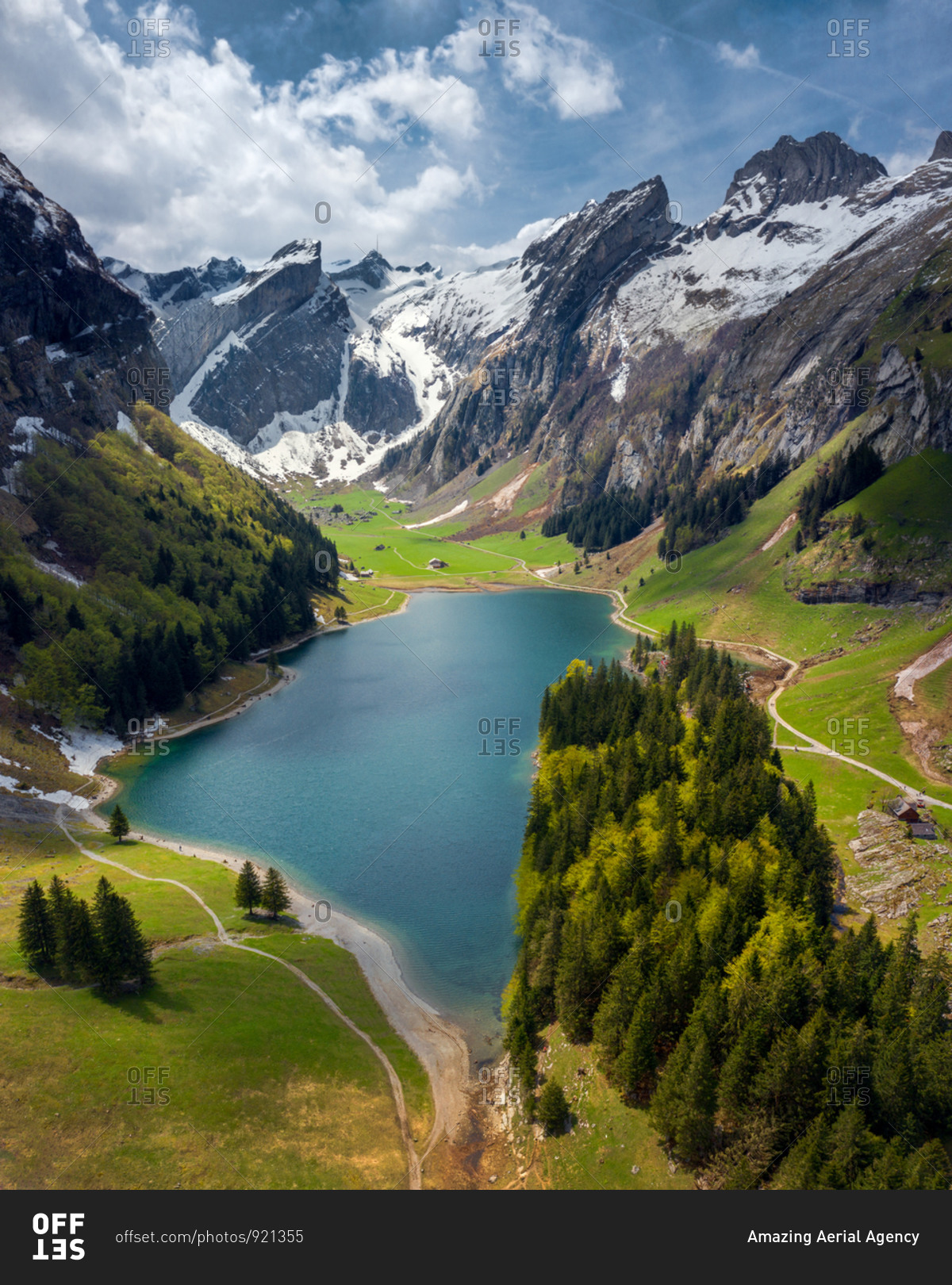 Aerial view of the Seealpsee lake surrounded with mountains in canton ...