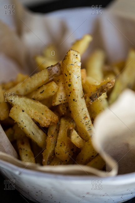 Close up of seasoned French fries
