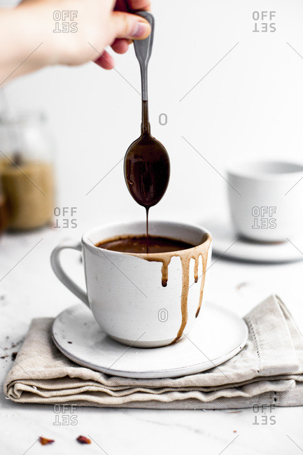 Spoon Dipped in Hot Chocolate Mug