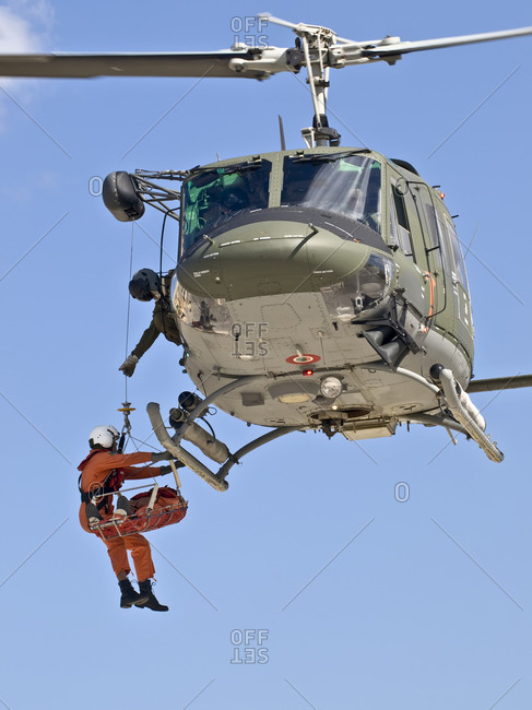 Luqa, Malta - October 5, 2008: Military helicopter crew carrying out medevac