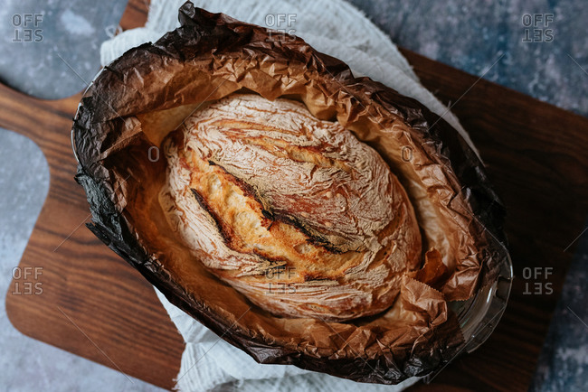 Overhead view of homemade artisan bread in a baking dish